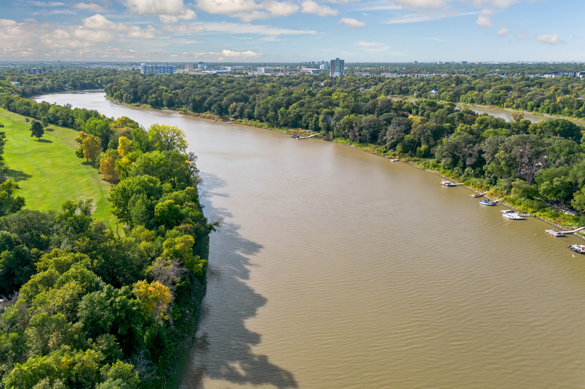 Aerial view of the Red River winding past Wildwood Park